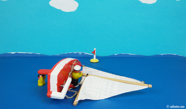 Figure 137: The heavier crewmember can release the masthead now and climbs up to the edge that stands out of the water.